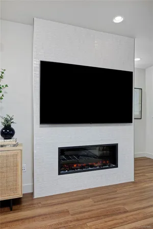 a kitchen with stainless steel appliances kitchen island granite countertop a sink and cabinets