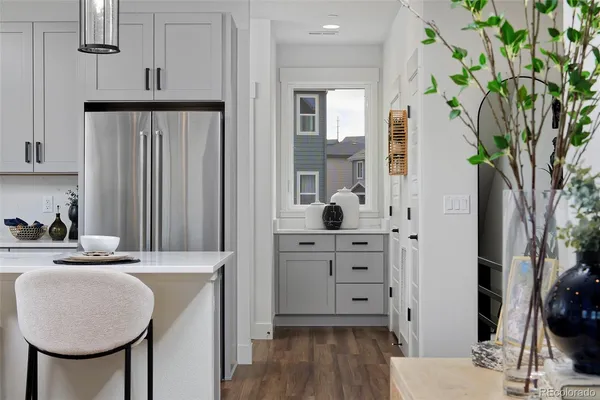 a dining room with table and chairs