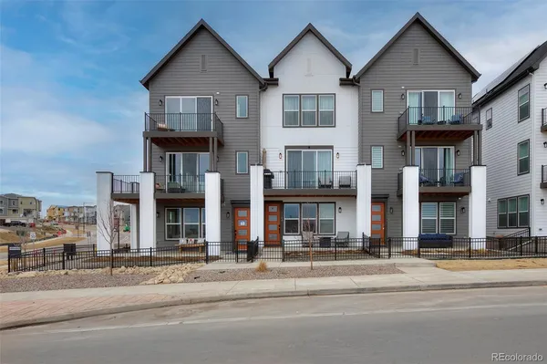a view of a brick building from a balcony