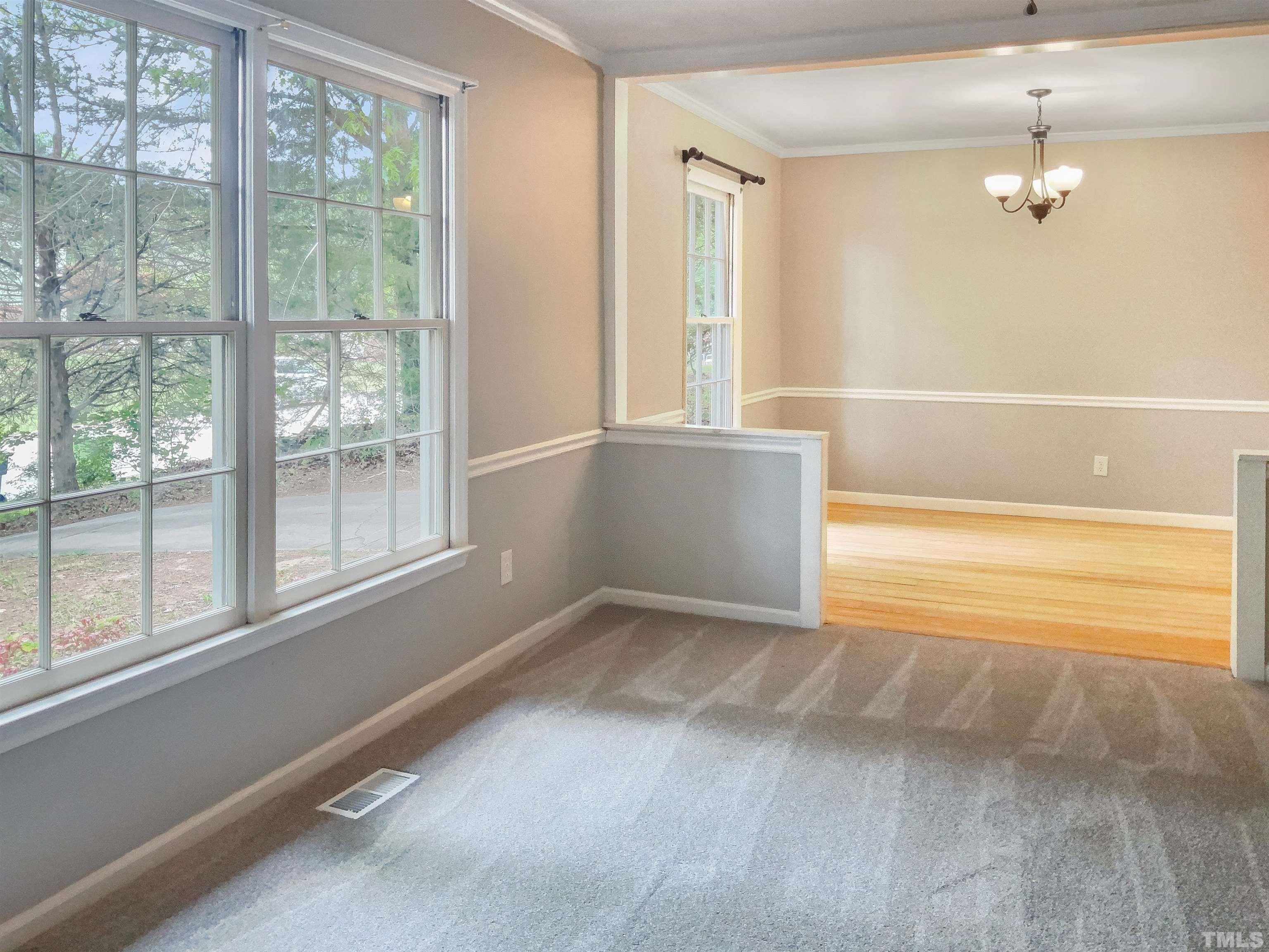 7312 Mine Valley Road Raleigh, NC 27615 - Photo 5 of 19 a view of an empty room with a window
