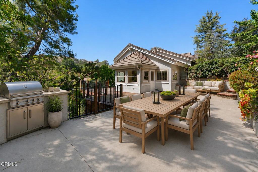 405 Woodcliffe Road Pasadena, CA 91105 - Photo 57 of 65 a view of a patio with a yard