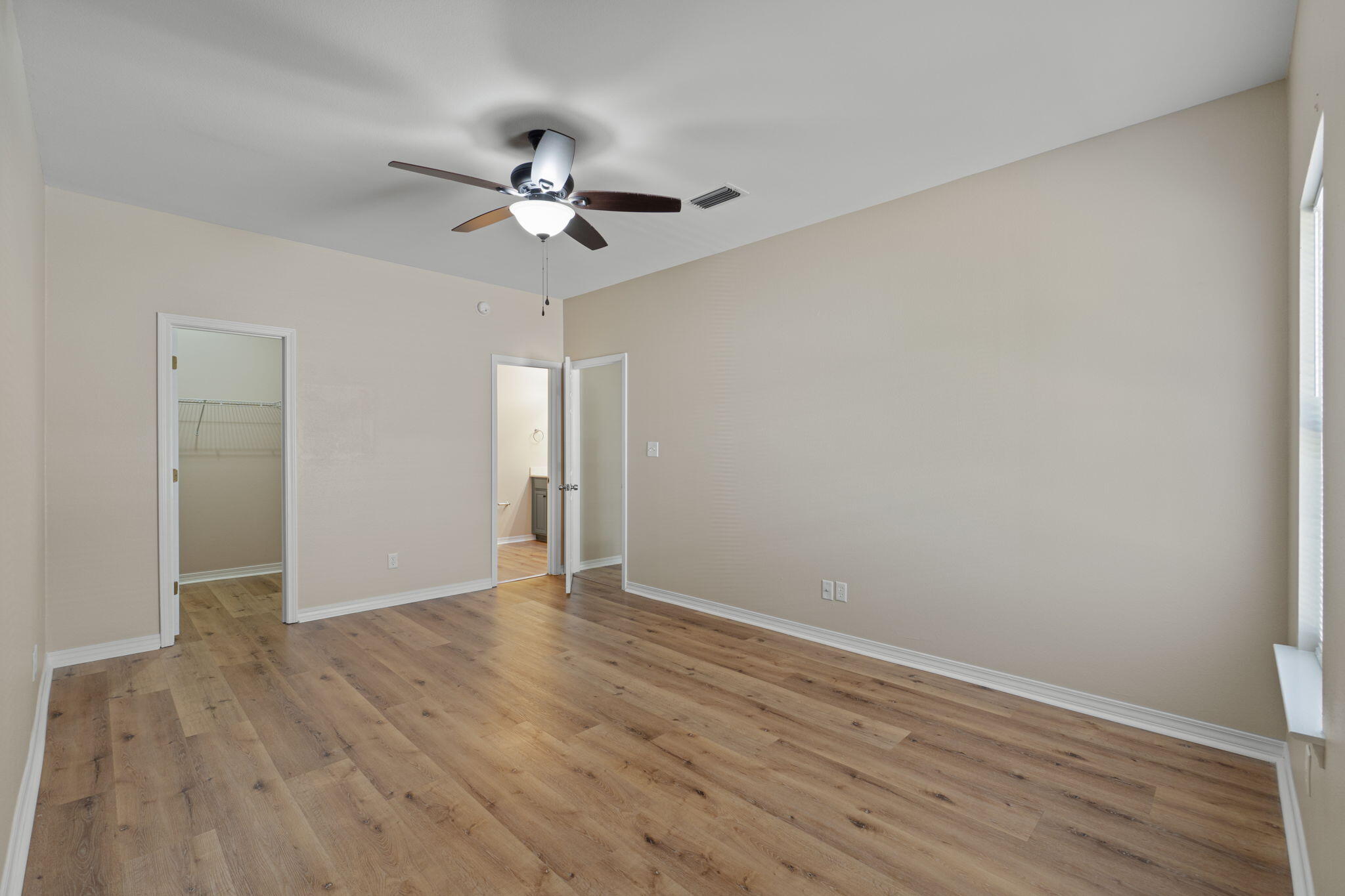 171 Enchanted Way Santa Rosa Beach, FL 32459 - Photo 17 of 37 1st Floor Primary Bedroom