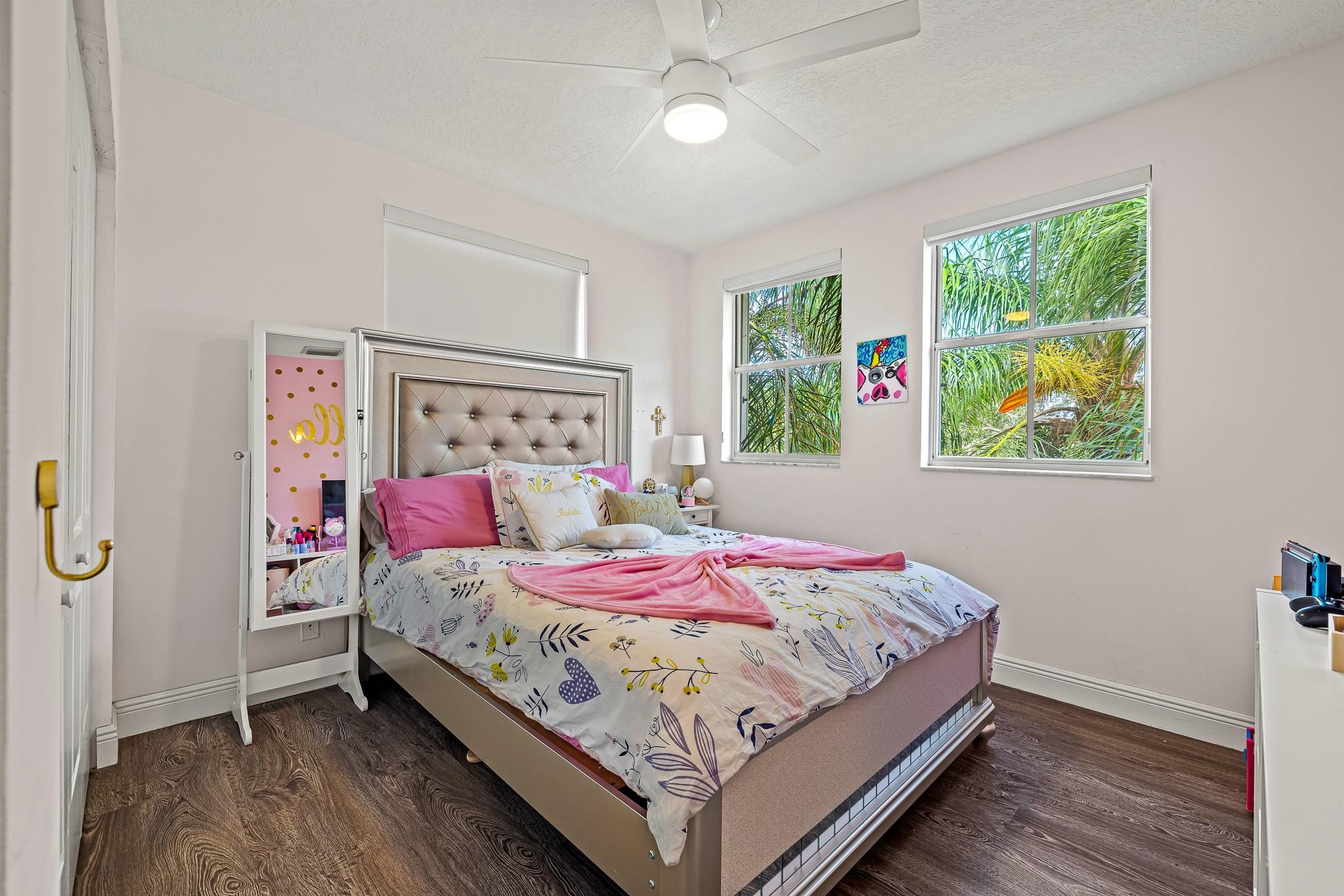 695 Falling Water Road Weston, FL 33326 - Photo 14 of 31 a bedroom with a bed and a window