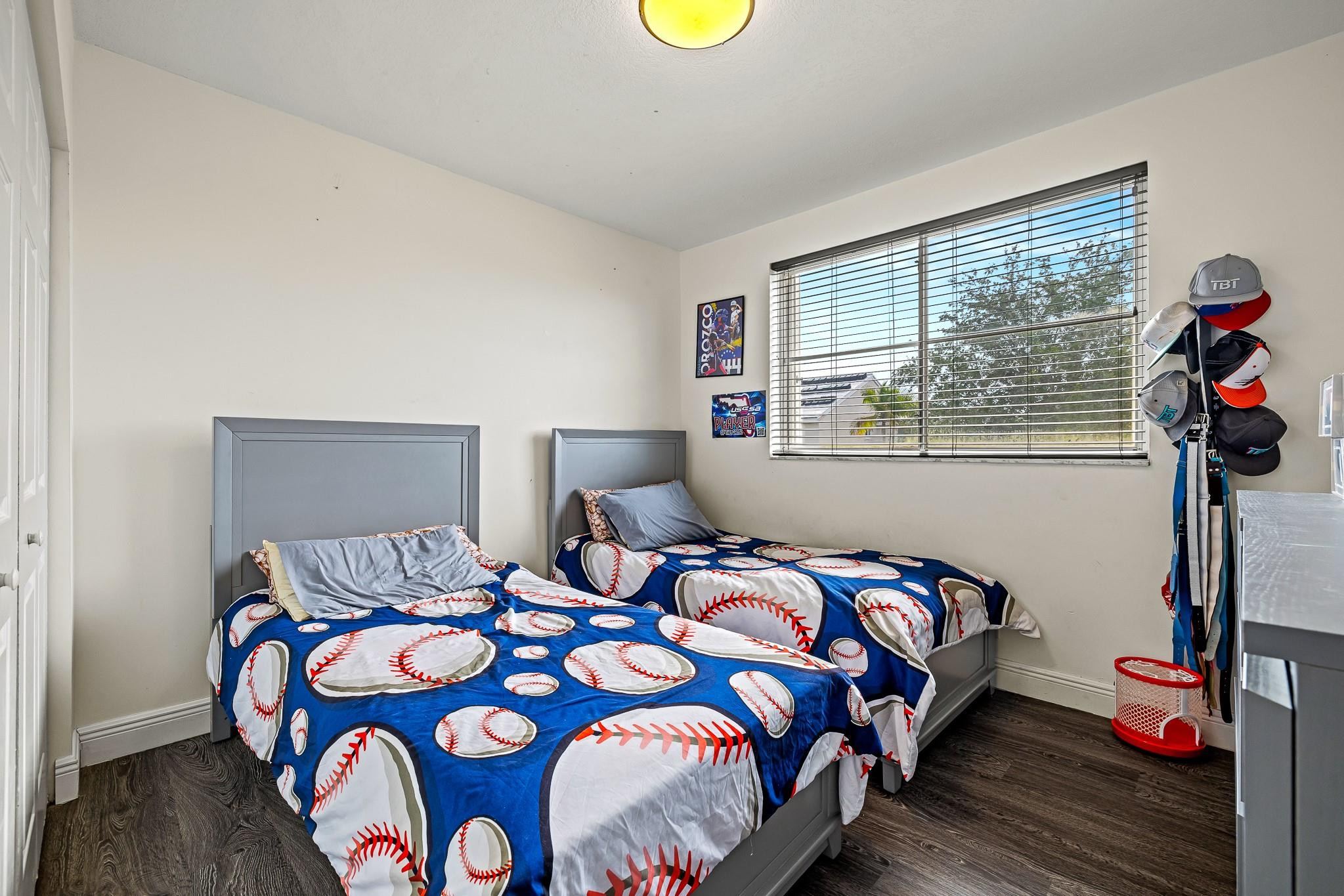 695 Falling Water Road Weston, FL 33326 - Photo 16 of 31 a bedroom with a bed and a window