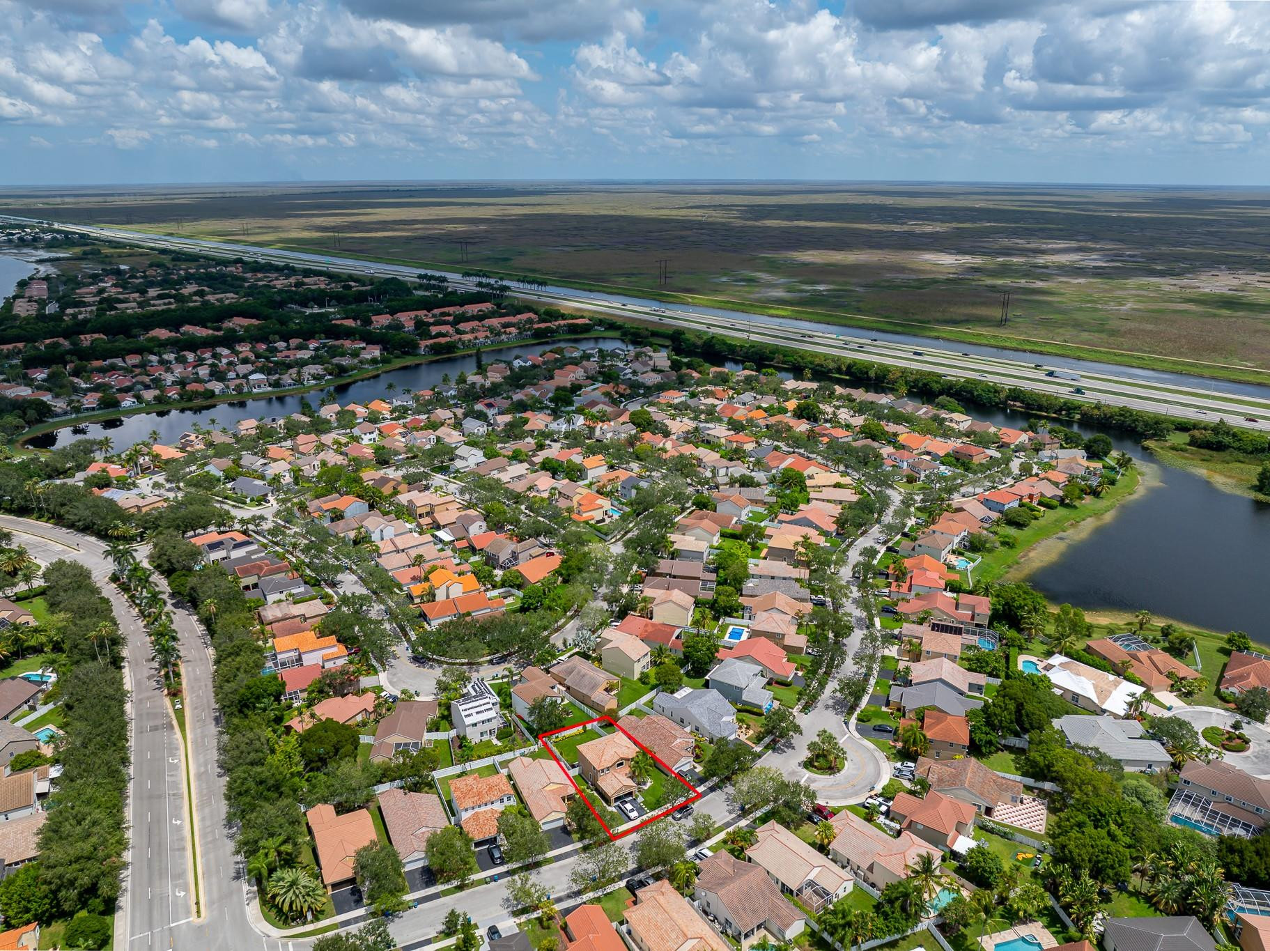 695 Falling Water Road Weston, FL 33326 - Photo 29 of 31 a view of an ocean from a balcony