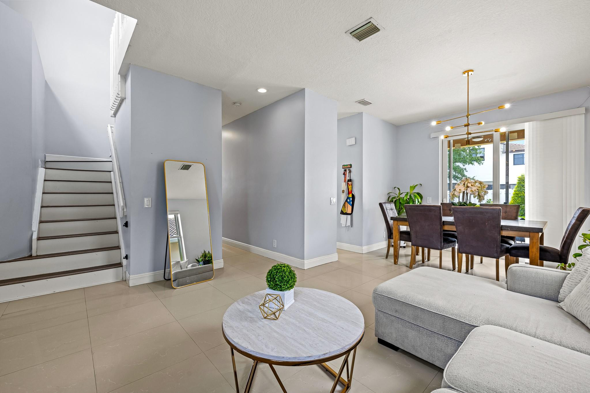 695 Falling Water Road Weston, FL 33326 - Photo 6 of 31 a view of a dining room with furniture