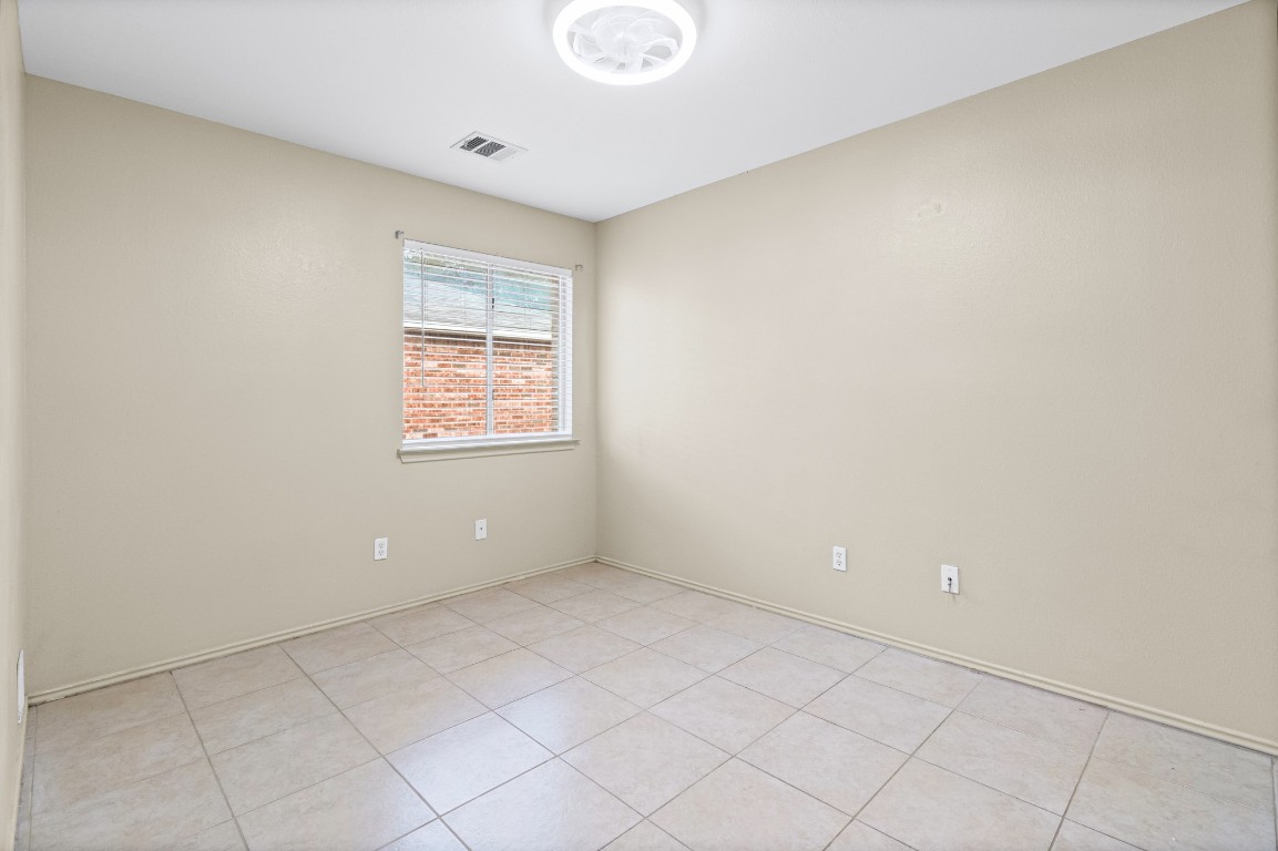 317 Tudor House Road Pflugerville, TX 78660 - Photo 18 of 28 a view of an empty room and window
