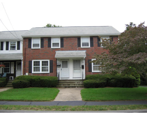 15 Clough Road, Unit 15 Dedham, MA 02026 - Photo 1 of 1 a front view of a house with garden