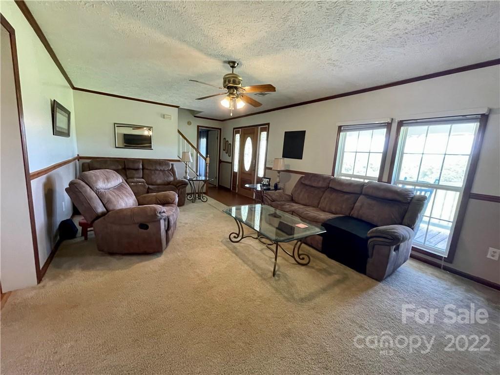 353 Duncan Road Rutherfordton, NC 28139 - Photo 14 of 42 a living room with furniture and a ceiling fan