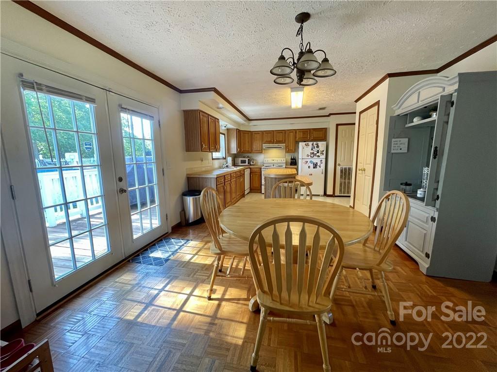 353 Duncan Road Rutherfordton, NC 28139 - Photo 16 of 42 a view of a dining room with furniture window and outside view