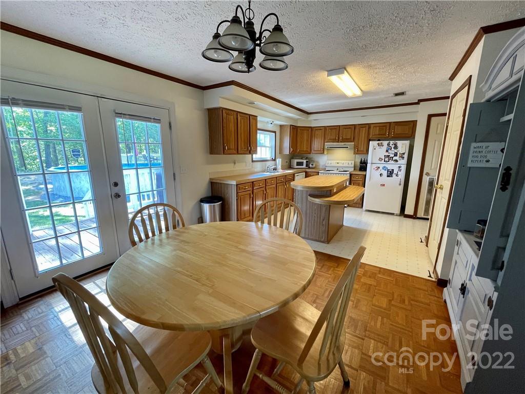 353 Duncan Road Rutherfordton, NC 28139 - Photo 17 of 42 a view of a dining room with furniture window and wooden floor