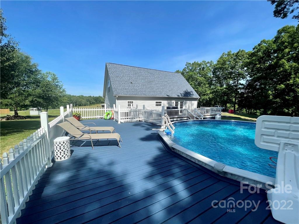 353 Duncan Road Rutherfordton, NC 28139 - Photo 34 of 42 swimming pool view with a seating space