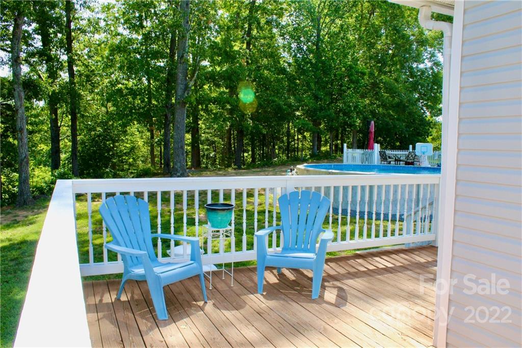 353 Duncan Road Rutherfordton, NC 28139 - Photo 42 of 42 a view of a chairs and table on the wooden deck
