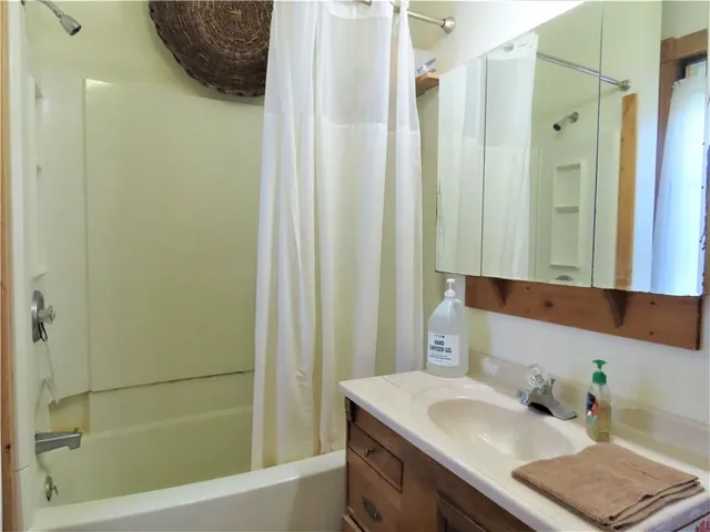 a view of a chairs and table in the balcony