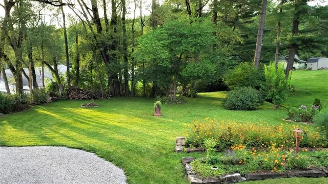 a white toilet sitting next to a bathroom sink