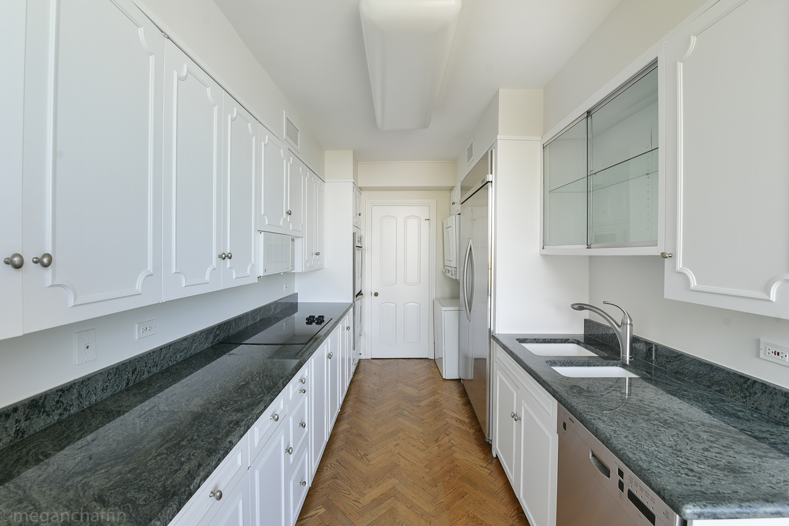 1420 Sheridan Road, Unit 6B Wilmette, IL 60091 - Photo 12 of 23 a kitchen with granite countertop a sink and cabinets
