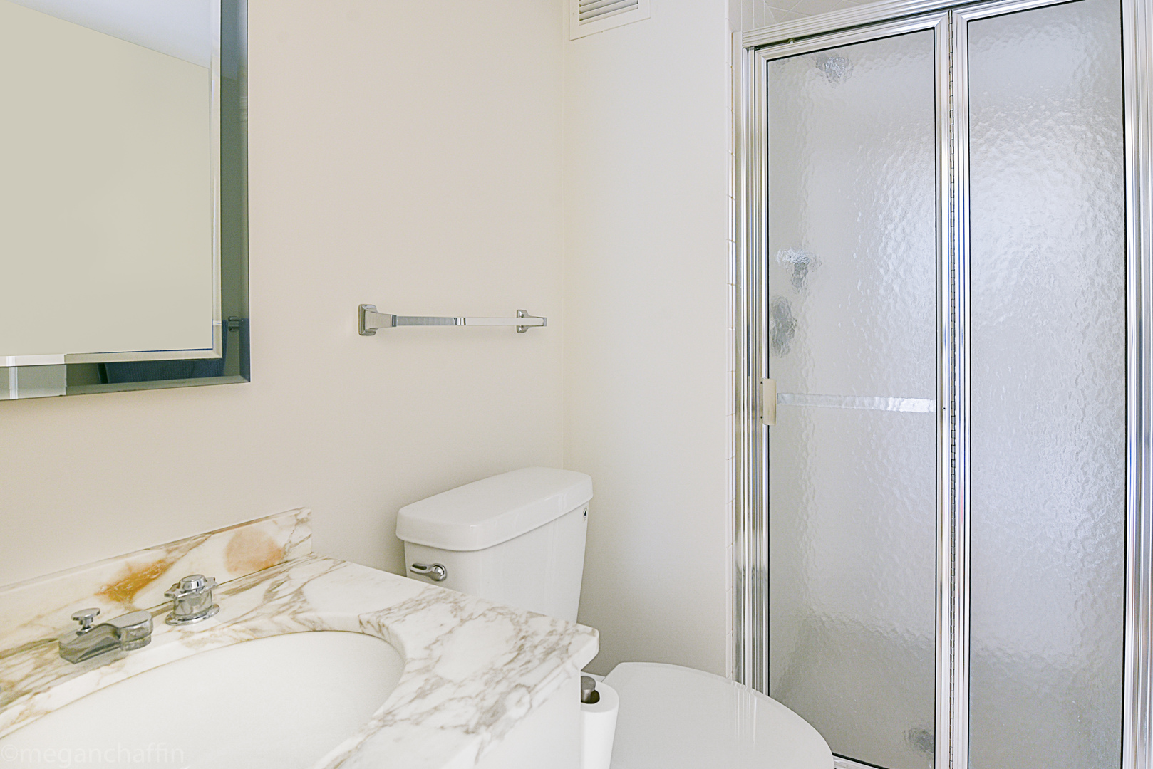 1420 Sheridan Road, Unit 6B Wilmette, IL 60091 - Photo 15 of 23 a white toilet sitting next to a bathroom sink