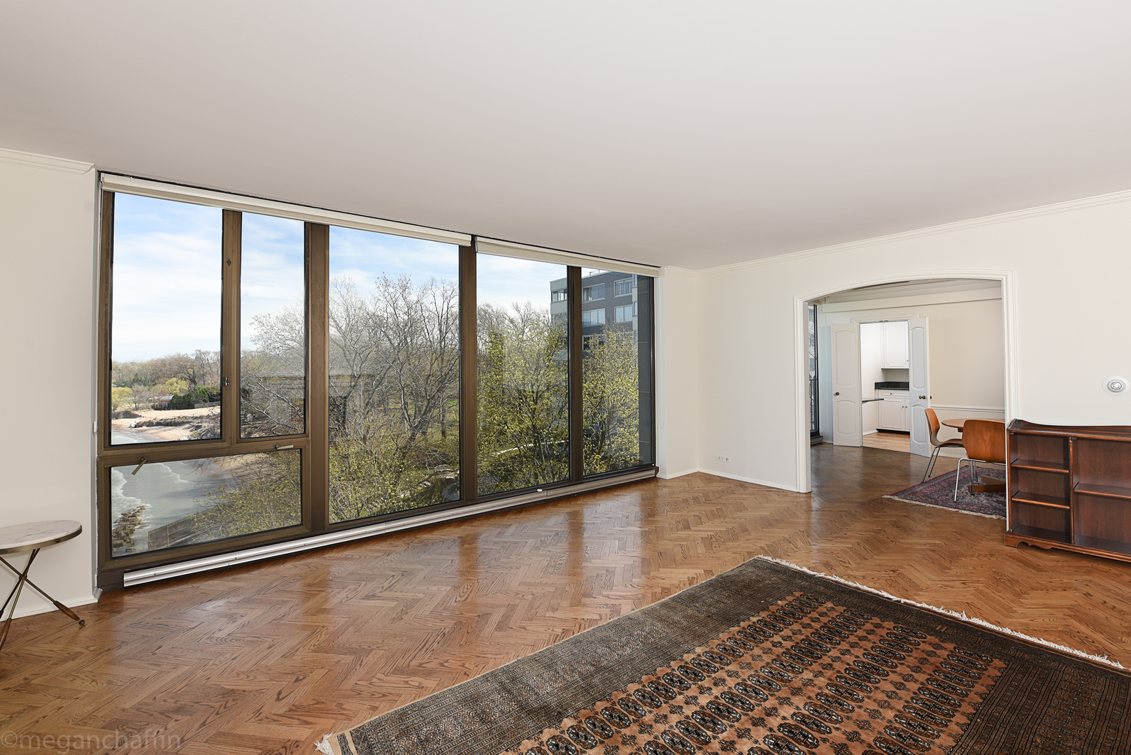 1420 Sheridan Road, Unit 6B Wilmette, IL 60091 - Photo 5 of 23 wooden floor in an empty room with a window