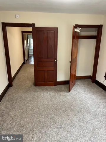 a view of front door with a vanity