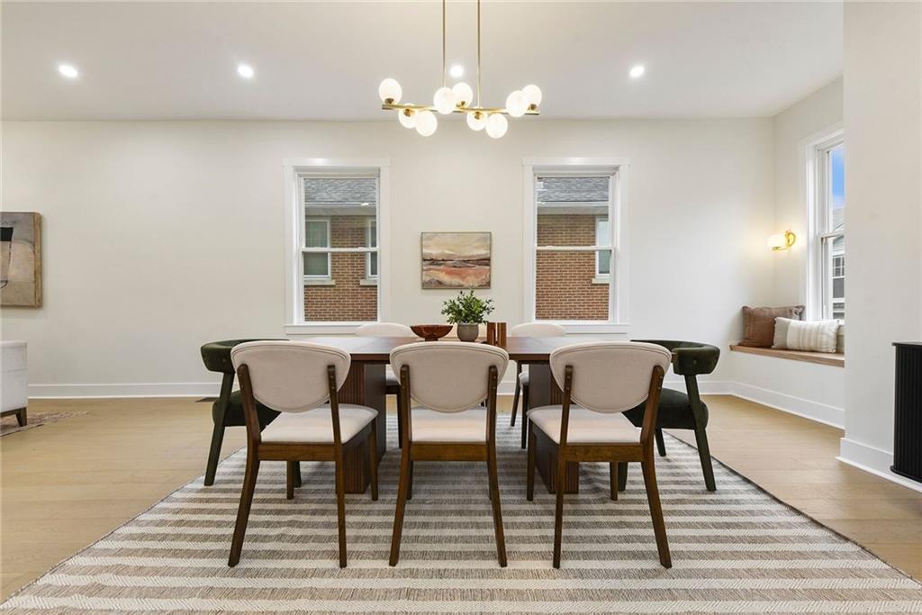 919 Heberton Street Pittsburgh, PA 15206 - Photo 17 of 49 a view of a dining room with furniture and wooden floor