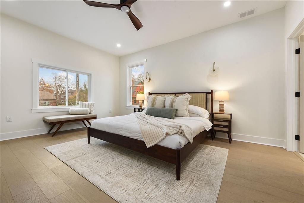 919 Heberton Street Pittsburgh, PA 15206 - Photo 26 of 49 a bedroom with a bed a table and chair