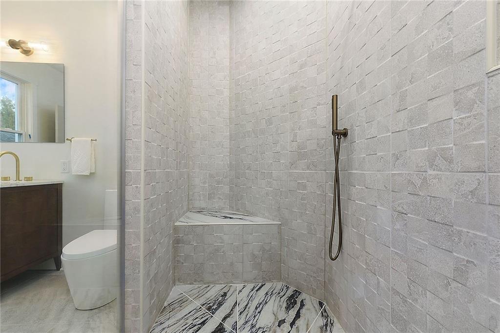 919 Heberton Street Pittsburgh, PA 15206 - Photo 34 of 49 a bathroom with a sink and toilet