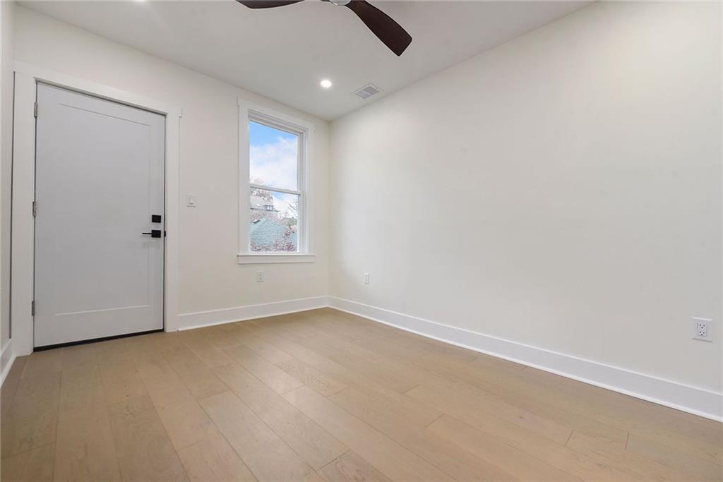 919 Heberton Street Pittsburgh, PA 15206 - Photo 41 of 49 an empty room with windows and cabinet