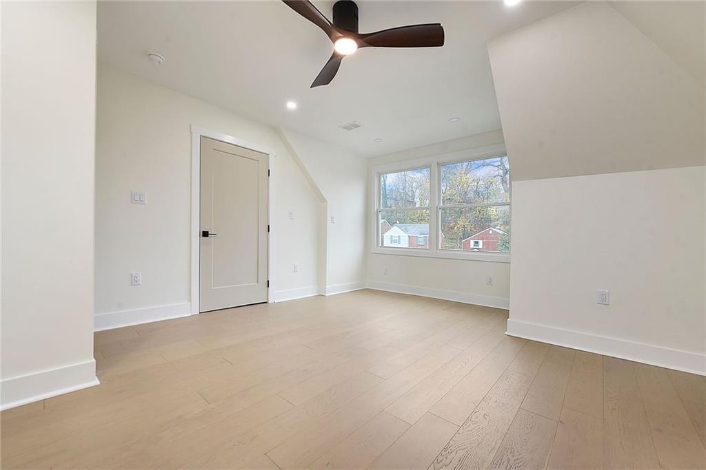 919 Heberton Street Pittsburgh, PA 15206 - Photo 44 of 49 an empty room with windows and cabinet
