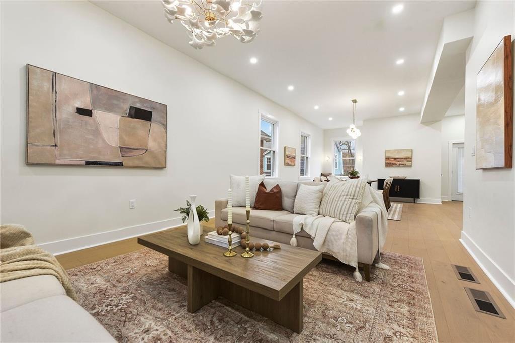 919 Heberton Street Pittsburgh, PA 15206 - Photo 9 of 49 a living room with furniture and a table