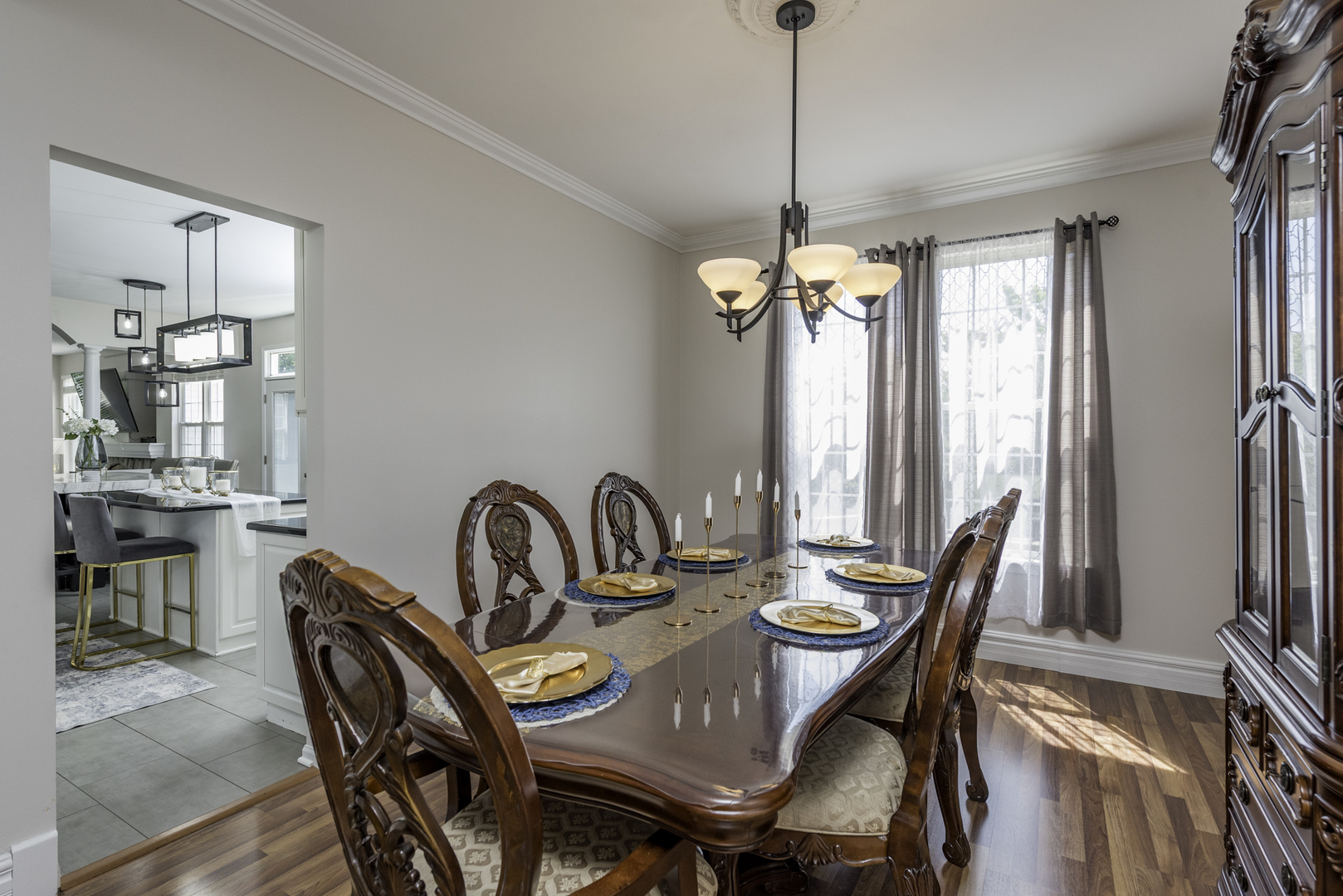 1650 Natures Way Lindenhurst, IL 60046 - Photo 11 of 55 a dining room with furniture a chandelier and window