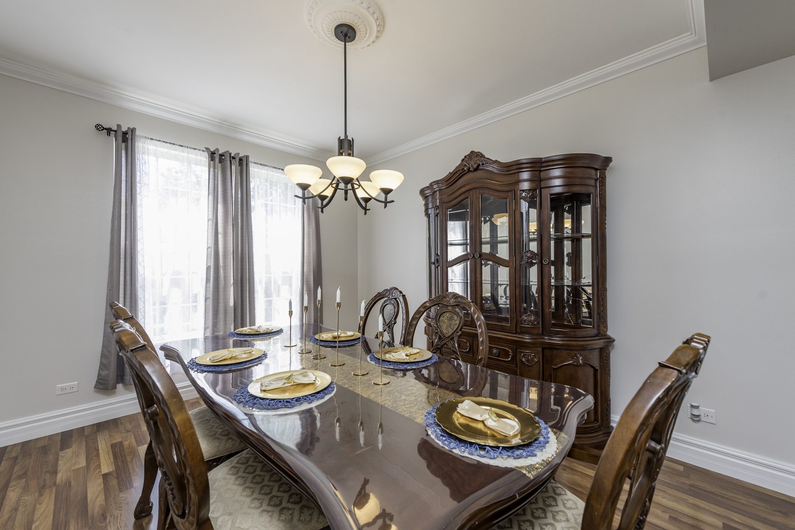 1650 Natures Way Lindenhurst, IL 60046 - Photo 12 of 55 a view of a dining room with furniture window and wooden floor