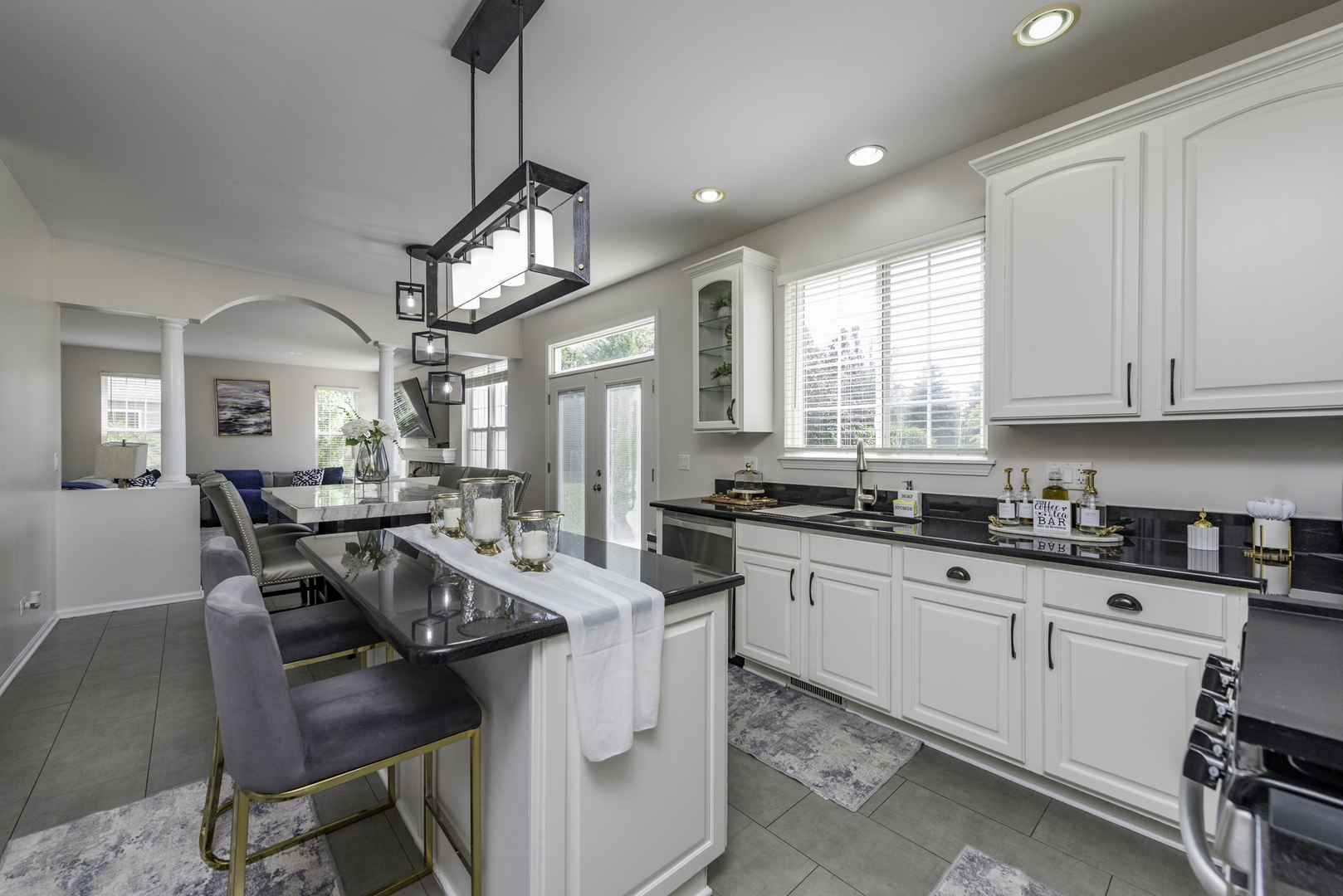 1650 Natures Way Lindenhurst, IL 60046 - Photo 15 of 55 a view of a dining room with furniture and a chandelier