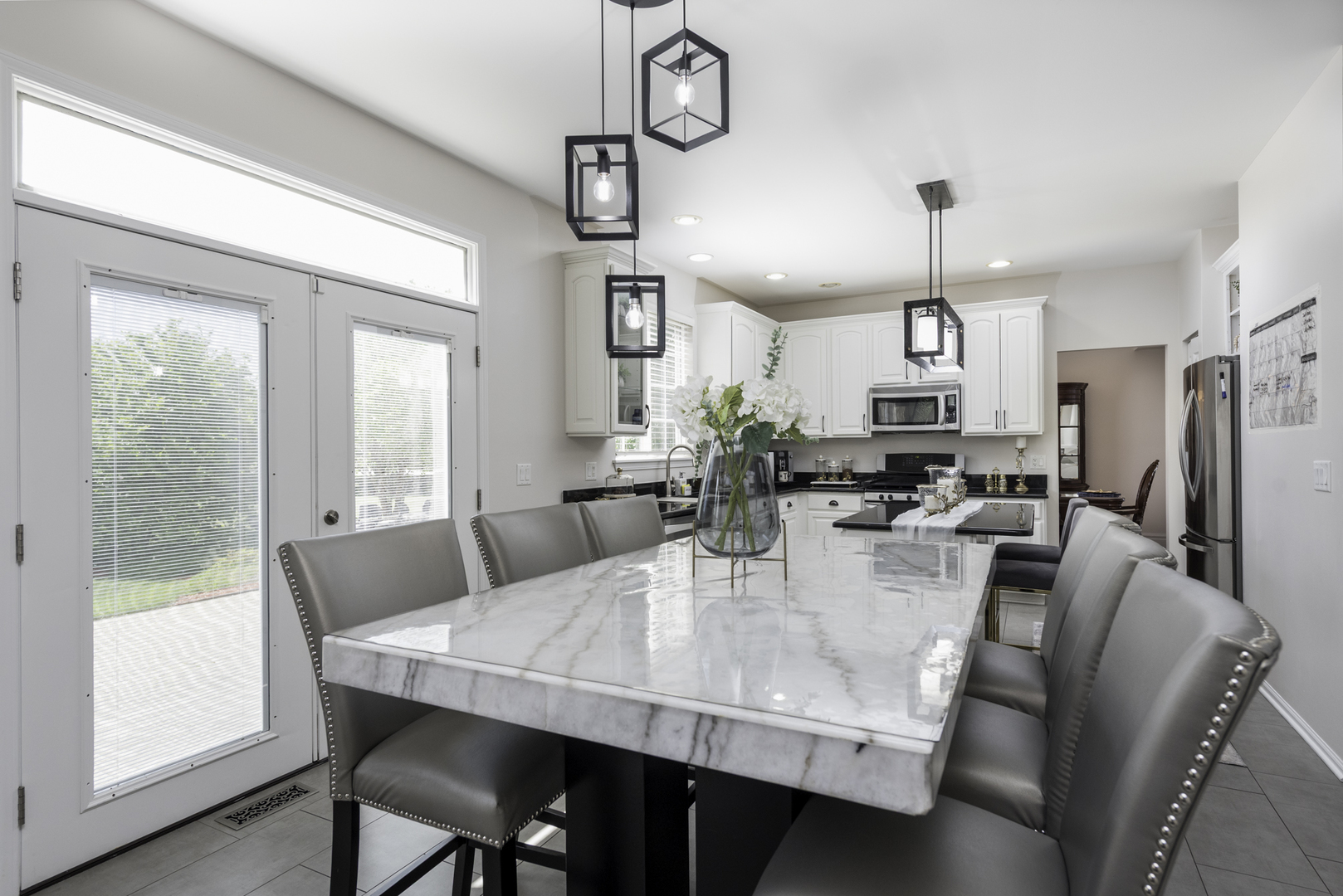 1650 Natures Way Lindenhurst, IL 60046 - Photo 19 of 55 a view of a dining room with furniture window and wooden floor