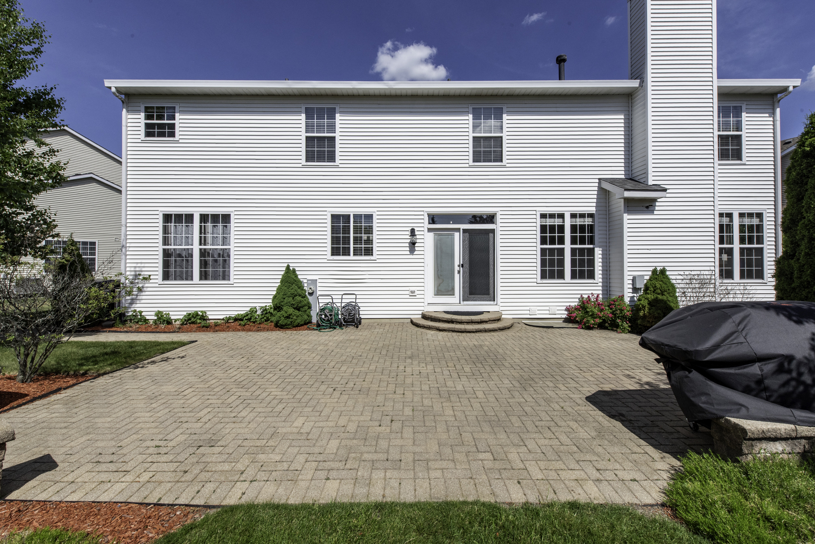 1650 Natures Way Lindenhurst, IL 60046 - Photo 41 of 55 a front view of house with yard and outdoor seating