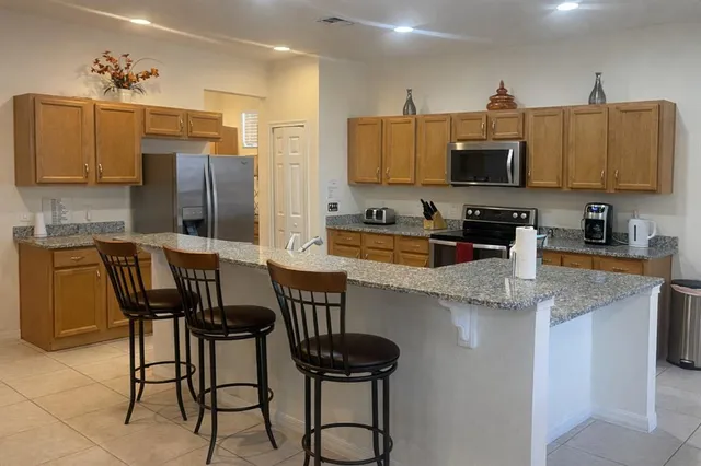 $4,495 | 446 Orange Cosmos Boulevard, Davenport, FL 33837