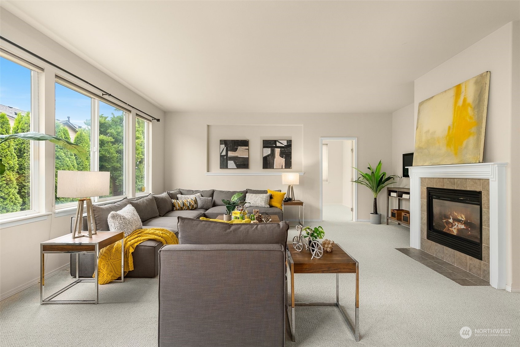 554 Rosario Avenue Northeast Renton, WA 98059 - Photo 15 of 38 a living room with furniture and a fireplace