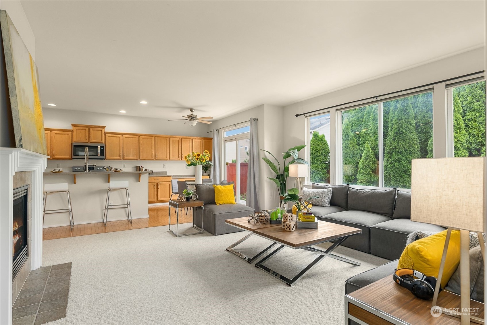 554 Rosario Avenue Northeast Renton, WA 98059 - Photo 16 of 38 a living room with furniture and a large window