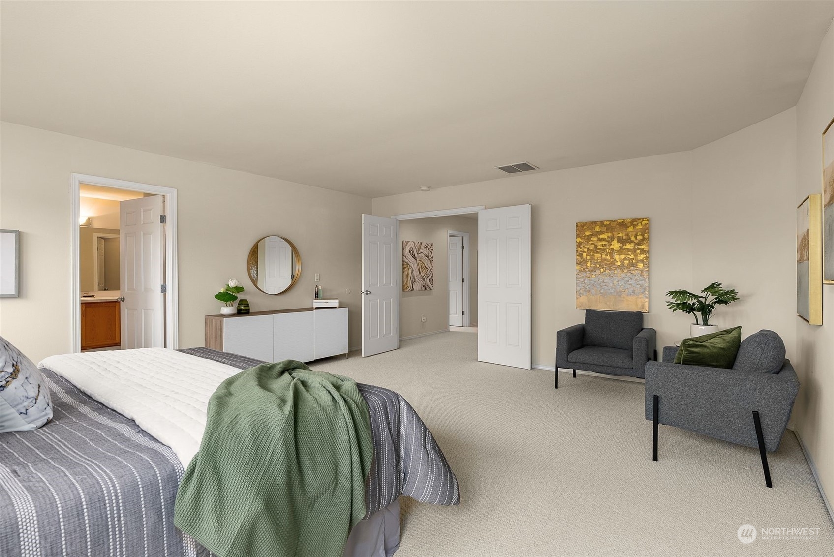 554 Rosario Avenue Northeast Renton, WA 98059 - Photo 20 of 38 a bedroom with a bed and a couch