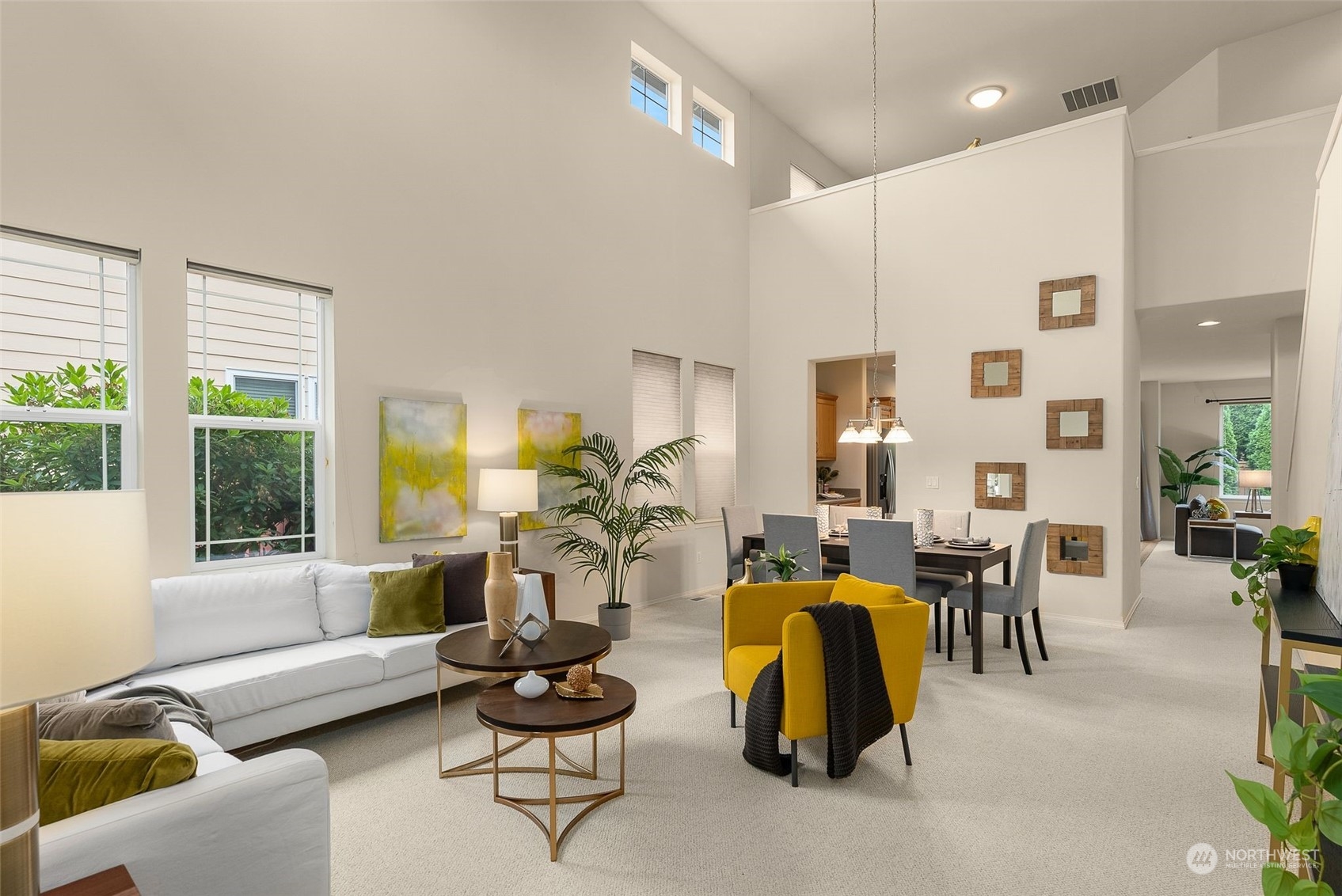 554 Rosario Avenue Northeast Renton, WA 98059 - Photo 2 of 38 a living room with furniture and a table