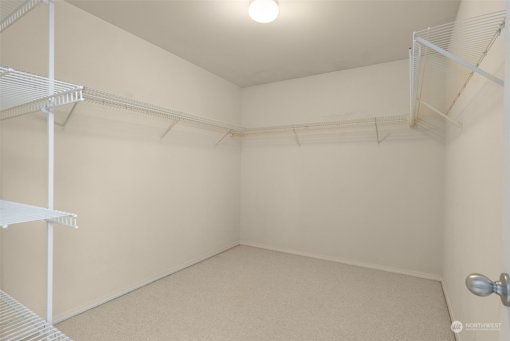 554 Rosario Avenue Northeast Renton, WA 98059 - Photo 23 of 38 a view of an empty walk in closet