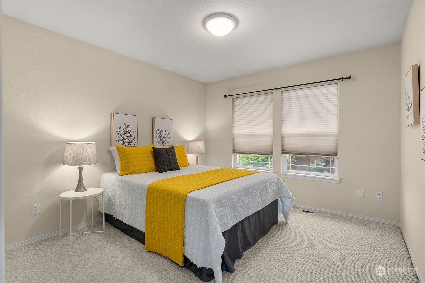 554 Rosario Avenue Northeast Renton, WA 98059 - Photo 24 of 38 a bedroom with a bed and lamp