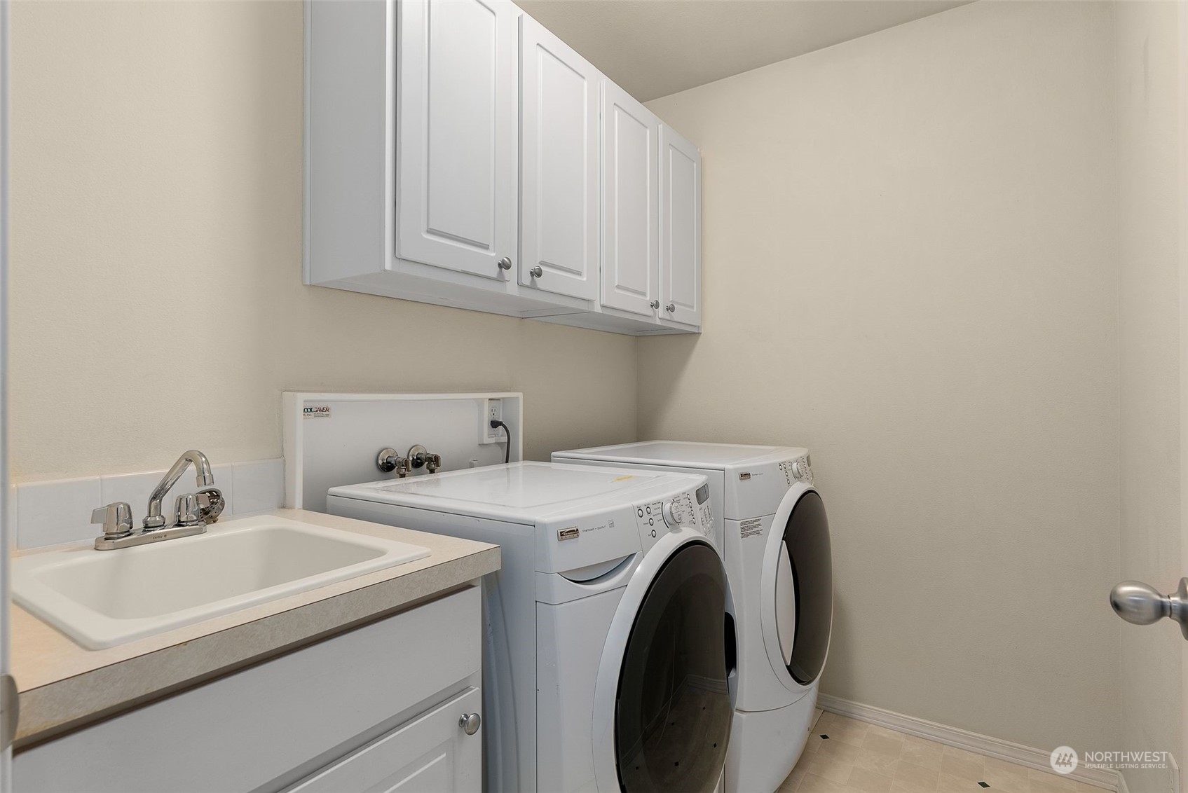 554 Rosario Avenue Northeast Renton, WA 98059 - Photo 28 of 38 a utility room with dryer and washer