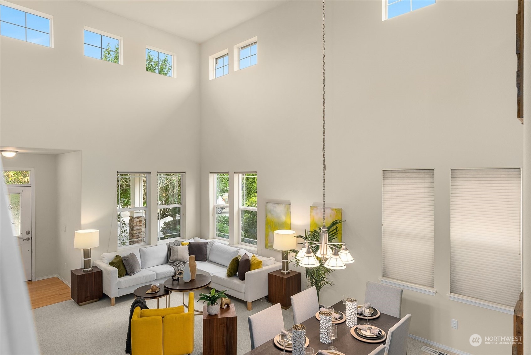 554 Rosario Avenue Northeast Renton, WA 98059 - Photo 29 of 38 a living room with furniture and a table