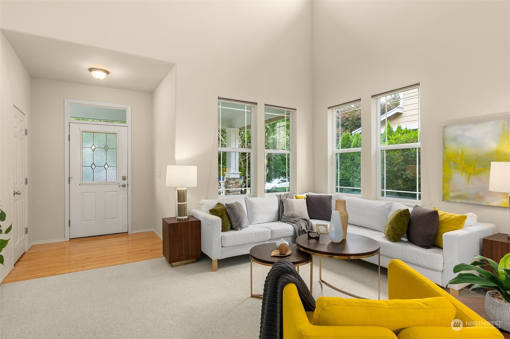 554 Rosario Avenue Northeast Renton, WA 98059 - Photo 3 of 38 a living room with furniture and floor to ceiling windows