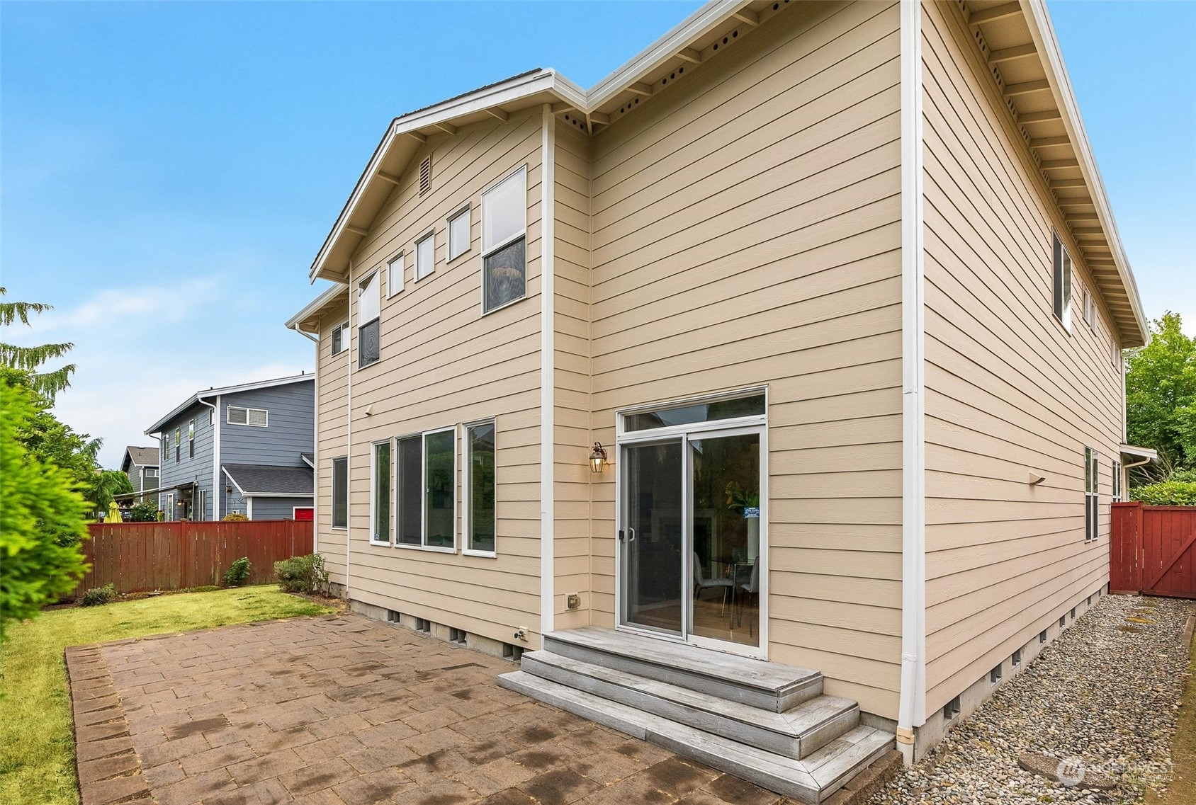 554 Rosario Avenue Northeast Renton, WA 98059 - Photo 33 of 38 a view of a white house with many windows