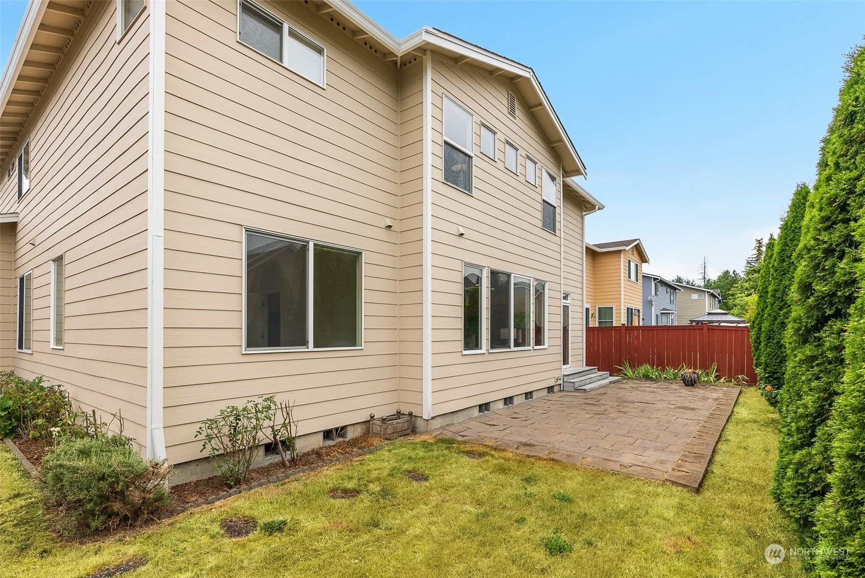 554 Rosario Avenue Northeast Renton, WA 98059 - Photo 34 of 38 a view of a house with a yard
