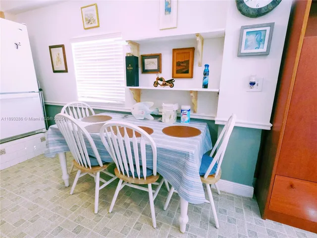 a table and chairs in a patio