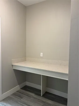 a view of room with table and chair
