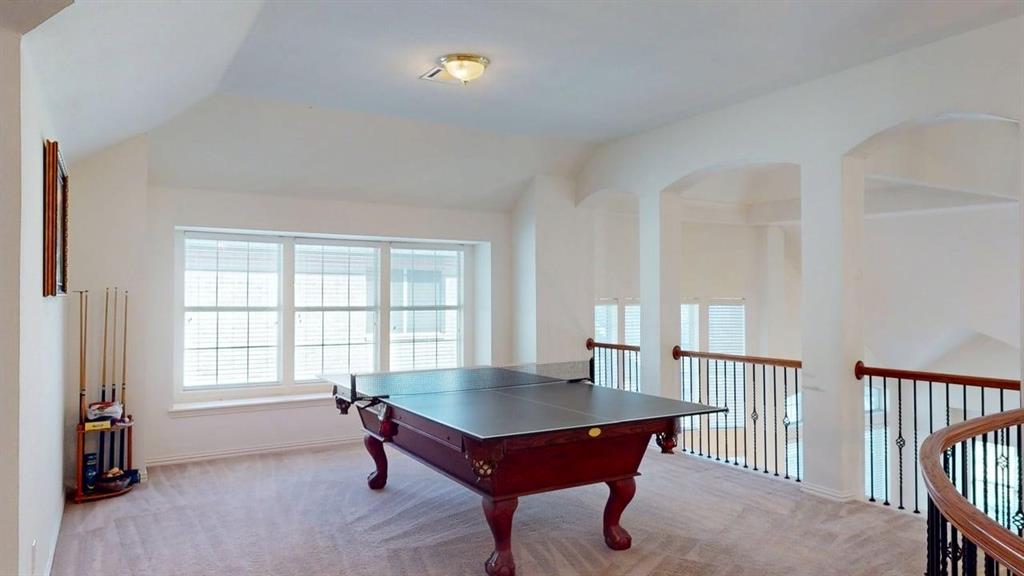 2022 Huntcliffe Court Allen, TX 75013 - Photo 23 of 40 Playroom featuring light colored carpet and healthy amount of natural light