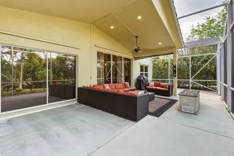 a view of a wooden house with a yard